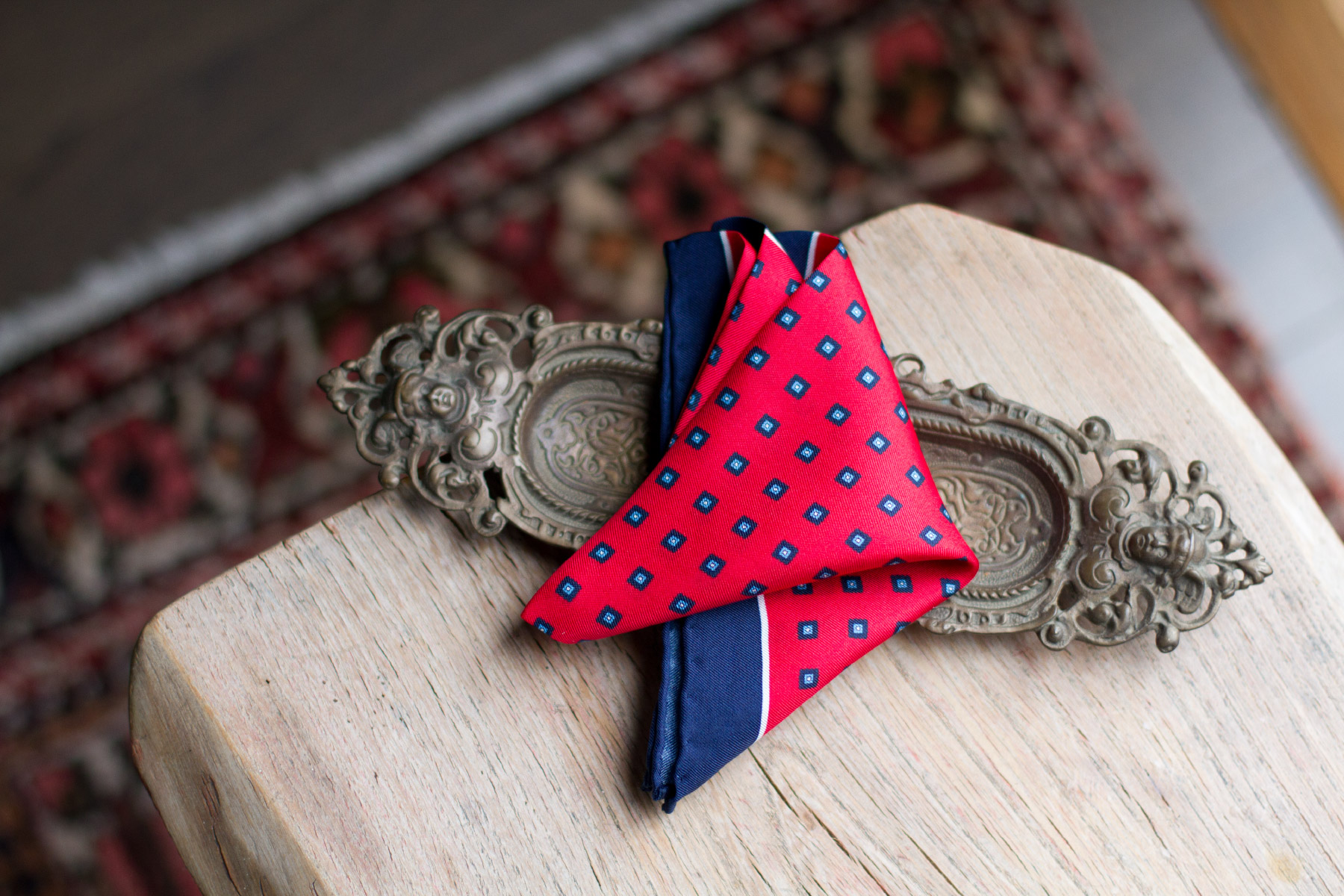 Fuze-Branding-Small-Business-Product-Lifestyle-Photography-Bespoke-Suit-Company-Evolution-Of-Style-Pocket-Square-Accessory-Styling-Red-Blue-Paisley
