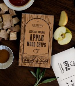 Lifestyle and Product Photography Example for Amazon - Cooking Gift Set Co. Apple Wood Chips on a cutting board surrounded by sliced apples, wood chips, and spices - Design & Photography by Fuze Branding