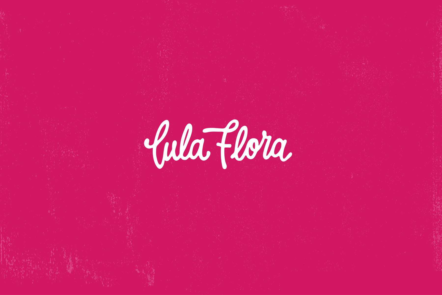 Lula Flora script logo in white