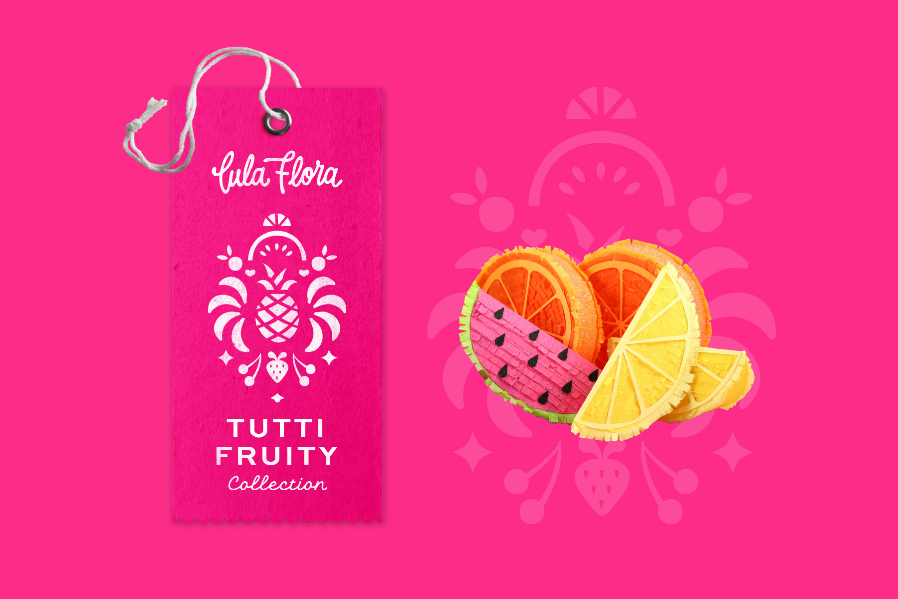 Watermelon, orange, and lemon miniature piñatas and a product hang tag
