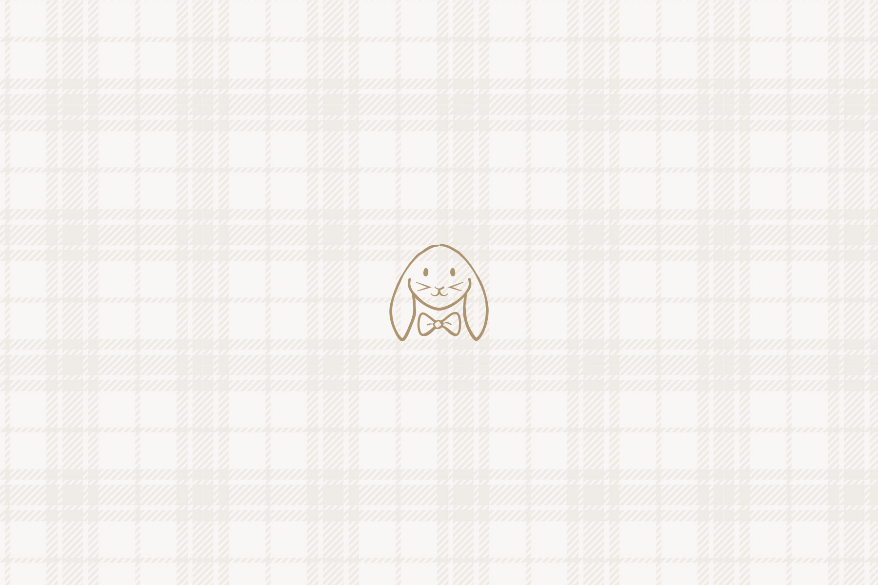 Outlined bunny head illustration on a plaid background